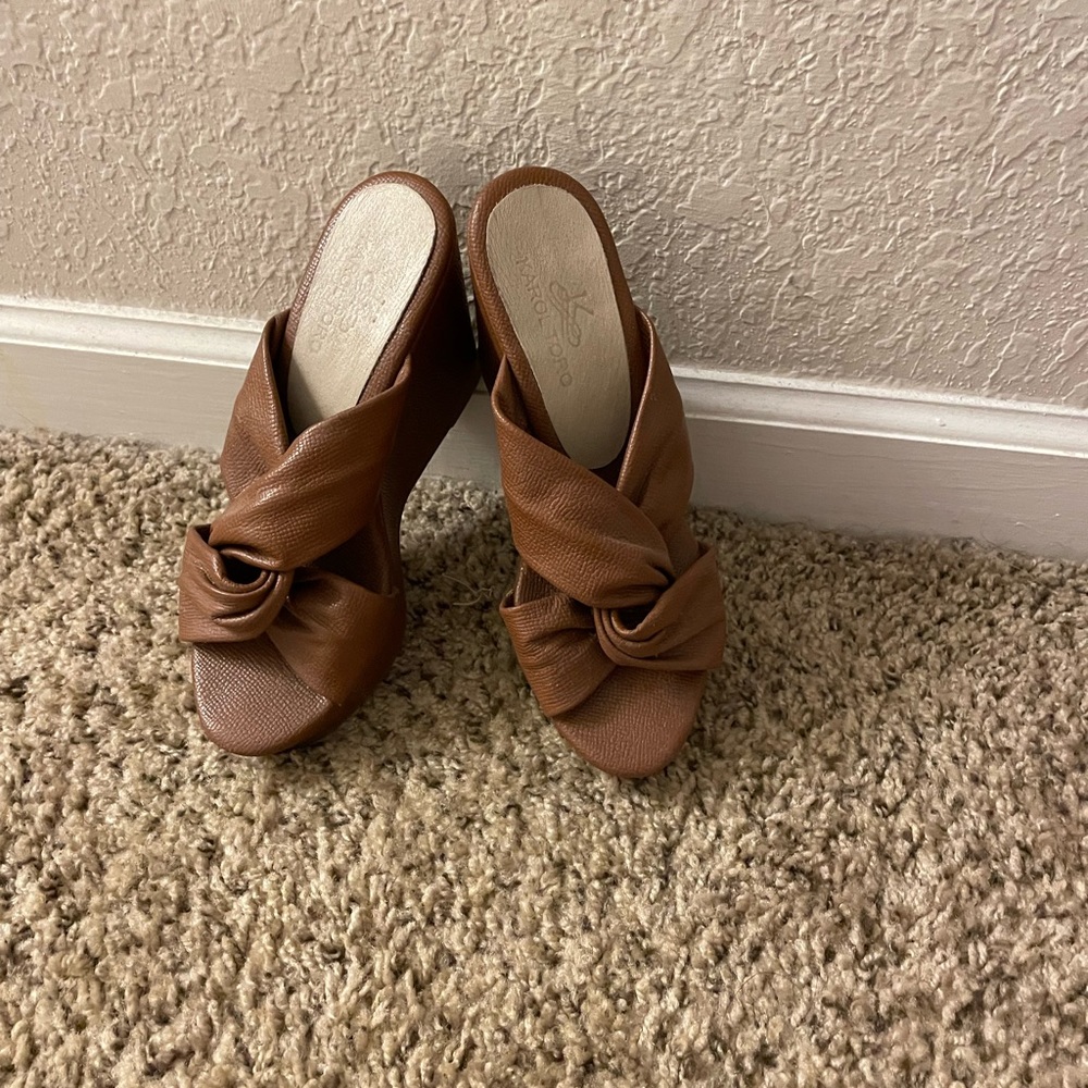Karol Toro brown leather wedge espadrilles.
